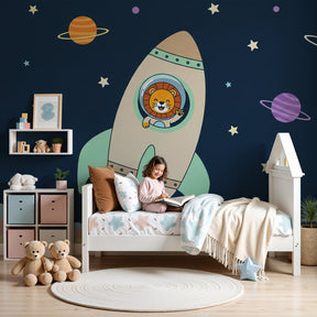 Space lion astronaut mural wallpaper in modern nursery with colorful planets by Kids-Mundo
