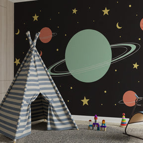 Children's space wallpaper featuring planets and stars in bright playroom setting
