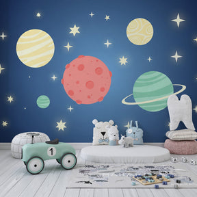 Colorful space-themed mural wallpaper inspiring adventure and learning in children's playroom