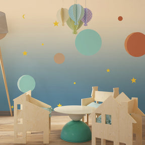 Celestial planets wallpaper with gradient blue background transforming kids room atmosphere