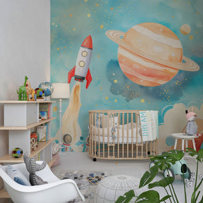 Space themed kids bedroom featuring rocket and planet mural wallpaper in watercolor style