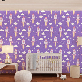 Purple space rocket wallpaper creating cosmic adventure theme in children's bedroom