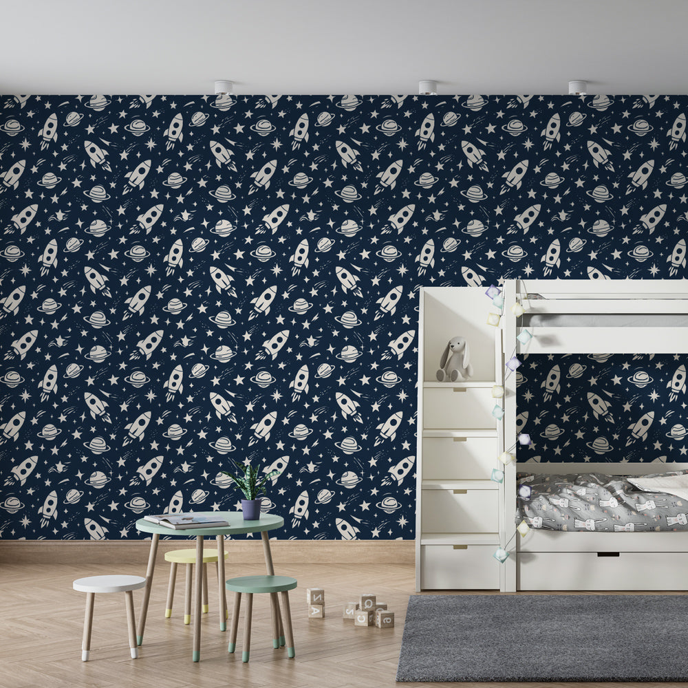 Night sky rocket wallpaper creating cosmic nursery decor with blue background
