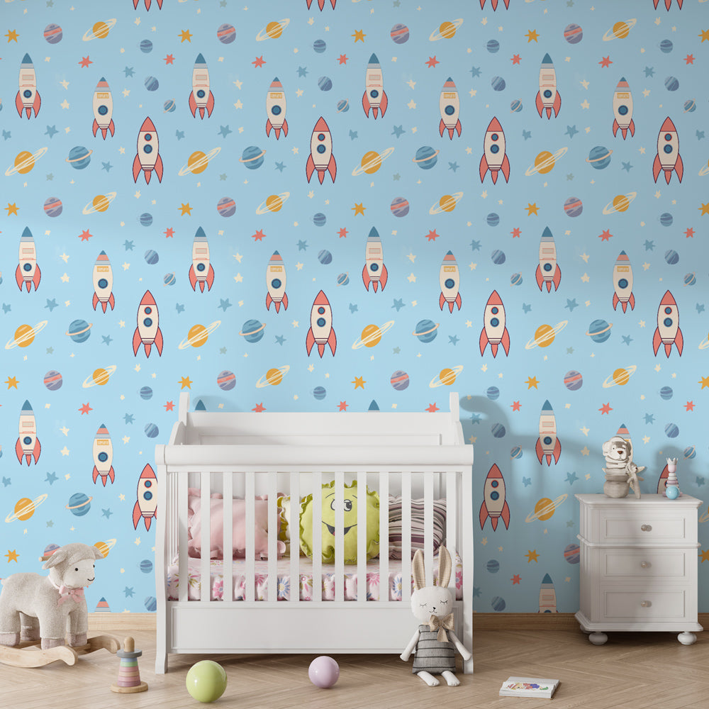 Blue space-themed mural wallpaper creating cosmic atmosphere in children's nursery room
