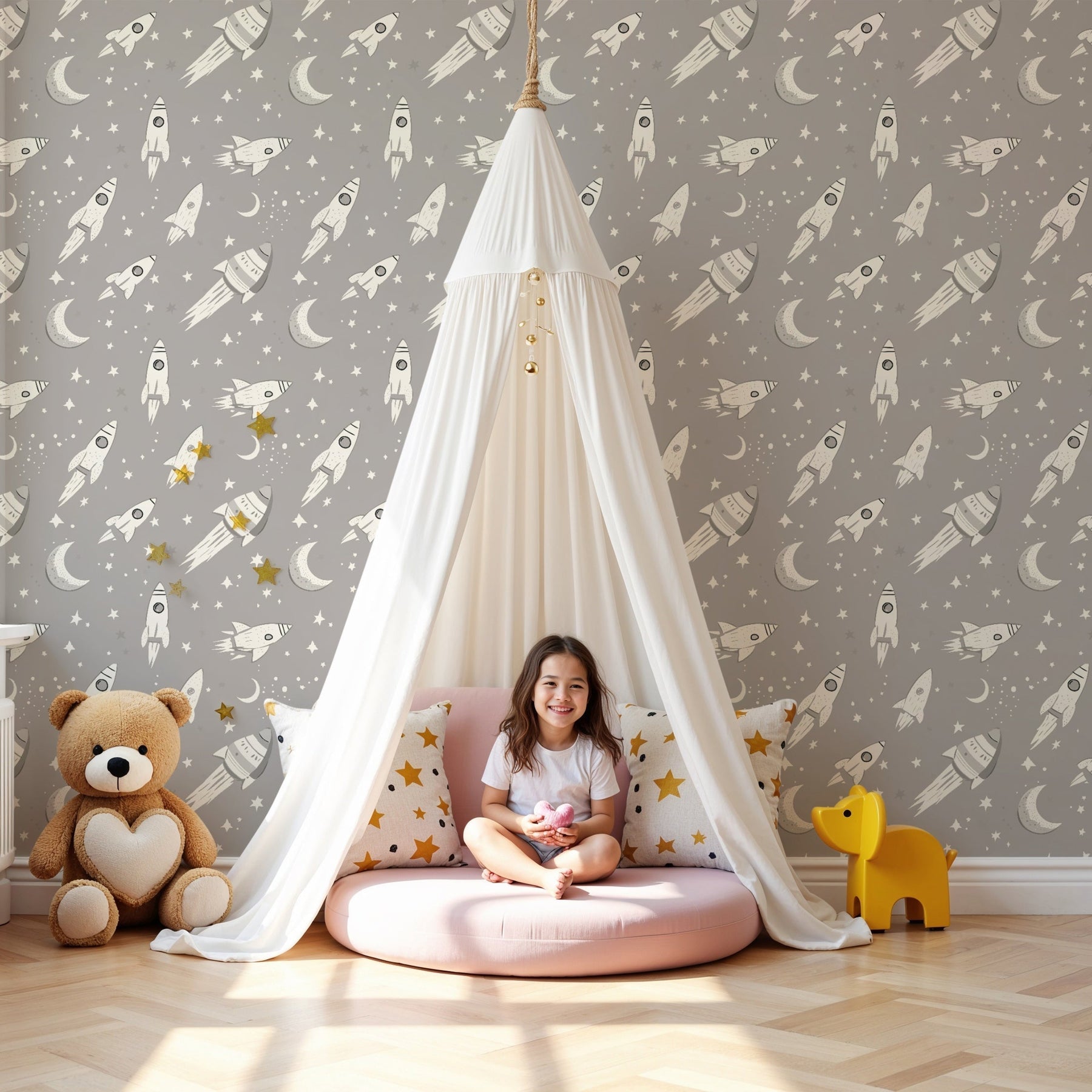 Space rocket mural wallpaper with moons and stars in modern nursery by Kids-Mundo