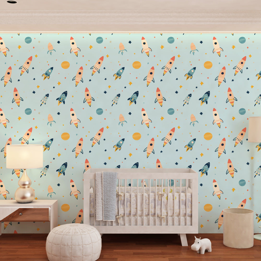 Blue space themed mural wallpaper transforming children's playroom into galactic adventure