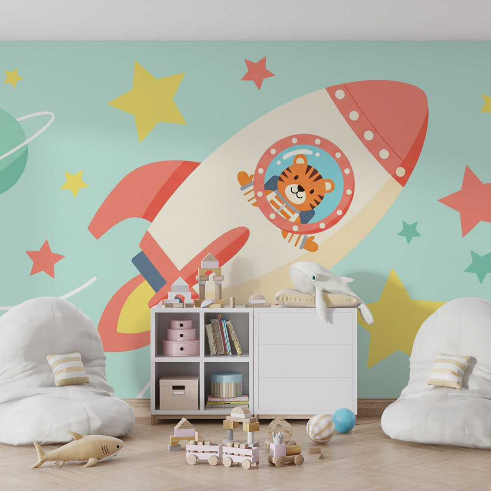 Children's space-themed mural wallpaper with colorful rocket and tiger in playroom setting