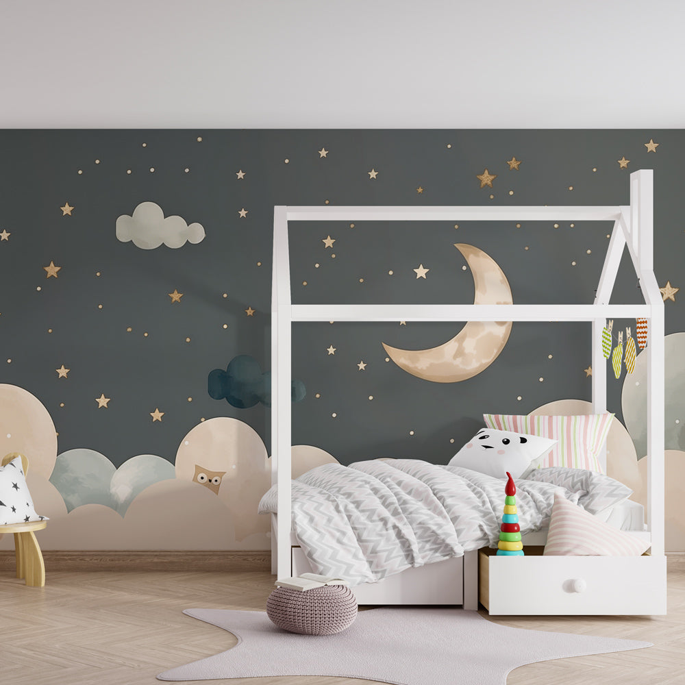 Golden moon and owl wallpaper creating peaceful baby bedroom atmosphere