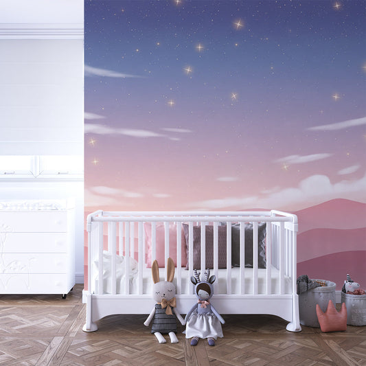 Kids-Mundo starry sky wall mural covering a feature wall in a soft pink kids bedroom