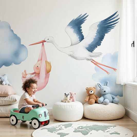Kids-Mundo stork carrying a baby wall mural styled as made-to-measure wallpaper in a soft nursery.