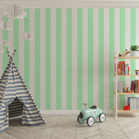 Soft green striped wallpaper creating calming atmosphere in children's bedroom
