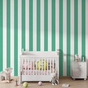 Vertical green striped wallpaper creating calm atmosphere in children's bedroom decor