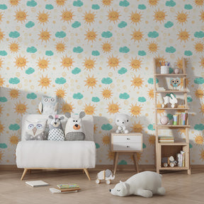 Playful sun and cloud mural wallpaper transforming kids playroom into joyful space