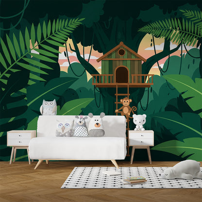 Kids-Mundo jungle treehouse wall mural glowing behind a bed in a child's bedroom at dusk.