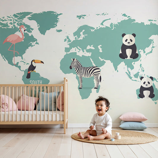 Kids-Mundo teal world map wall mural with flamingo and zebra artwork behind a nursery cot