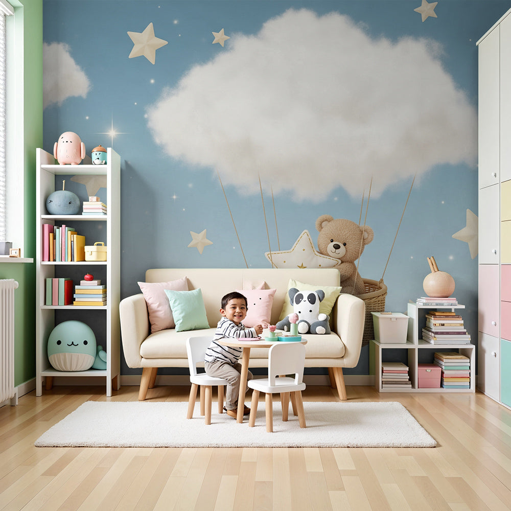 Kids-Mundo teddy bear cloud wall mural styled in a soft baby nursery with stars and blue sky.