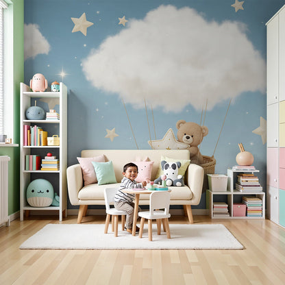 Kids-Mundo teddy bear cloud wall mural styled in a soft baby nursery with stars and blue sky.