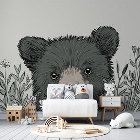 Floral teddy bear mural wallpaper installed in modern baby room with natural decor