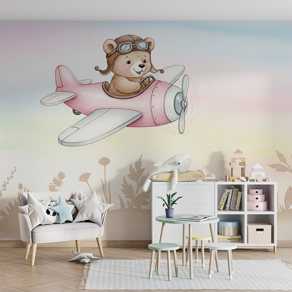Kids-Mundo teddy bear pilot wall mural adding gentle adventure to a soft pastel playroom.