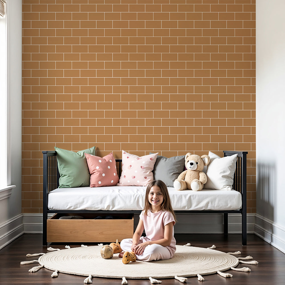 Nursery with a terracotta brick wall mural by Kids-Mundo behind a cot and shelving