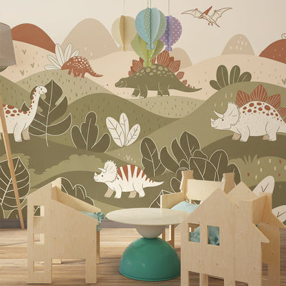 Kids-Mundo dinosaur hillside mural on a kids bedroom wall beside a bed and rug