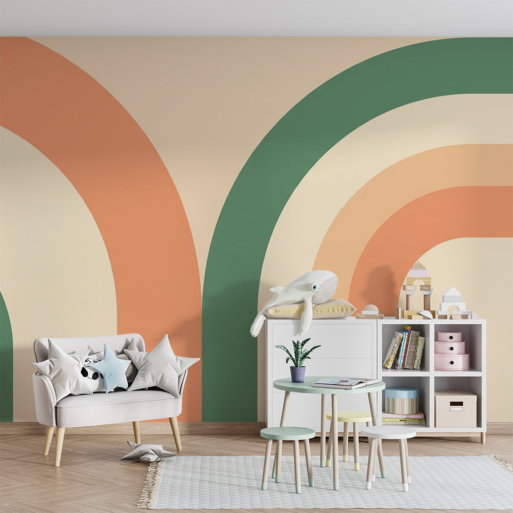 Kids-Mundo rainbow arch wall mural in terracotta and sage covering a feature wall in a kids' bedroom