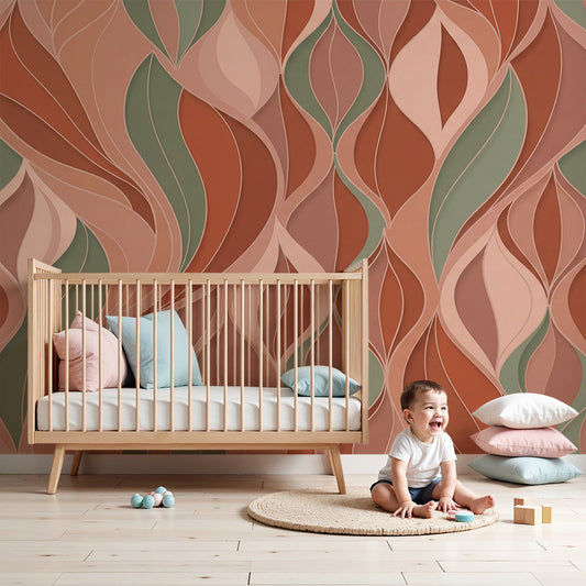 Nursery with a terracotta and sage wavy ogee wall mural by Kids-Mundo behind a cot