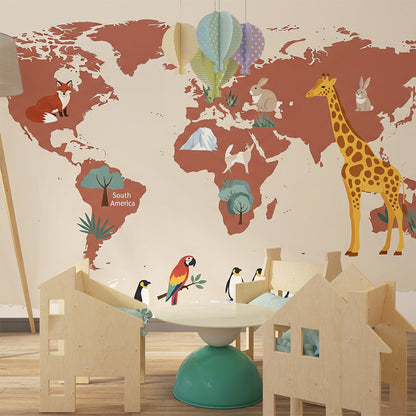 Kids-Mundo terracotta world map wall mural with giraffe and rabbit motifs in a playroom corner