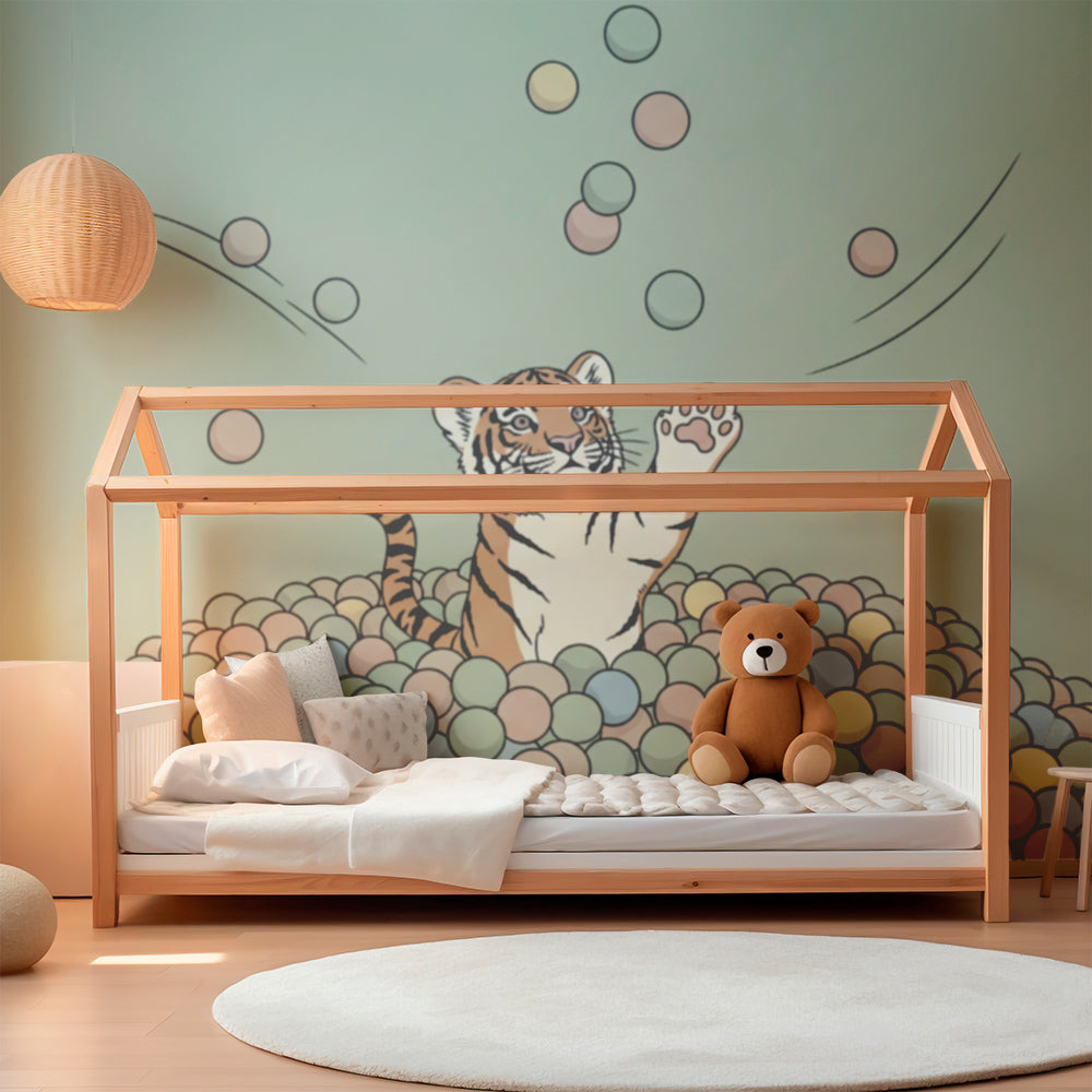 Kids-Mundo bouncy tiger ball pit wall mural brightening a busy playroom