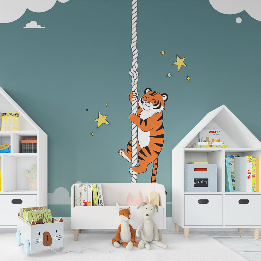 Kids-Mundo tiger climbing rope wall mural above a cot in a starry nursery
