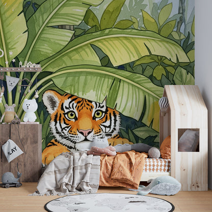 Kids-Mundo tiger cub peeking through leaves mural in a bright children's playroom