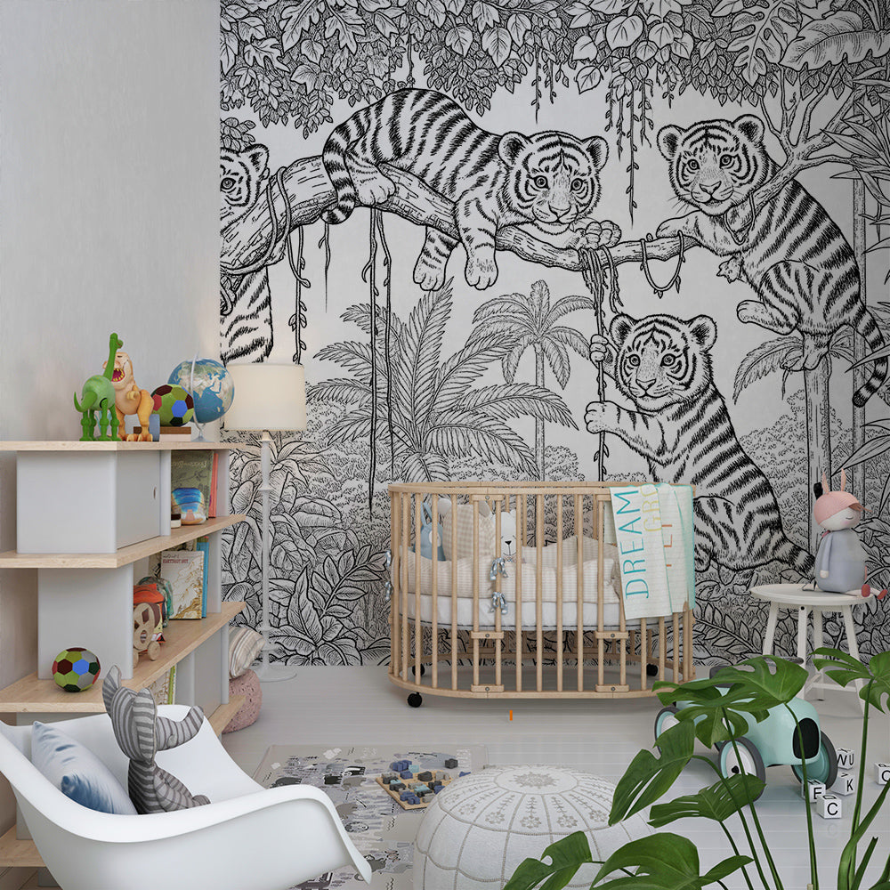 Kids-Mundo white tiger jungle wall mural brightening a playroom reading corner with cushions.