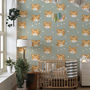Pastel tiger faces wallpaper displayed in cozy toddler room with natural accessories