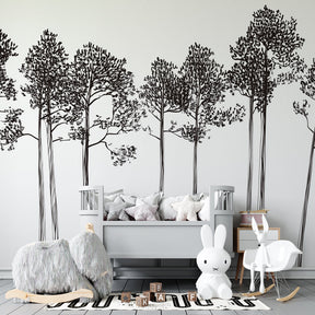 Forest tree wallpaper creating serene atmosphere in kids bedroom with natural decor