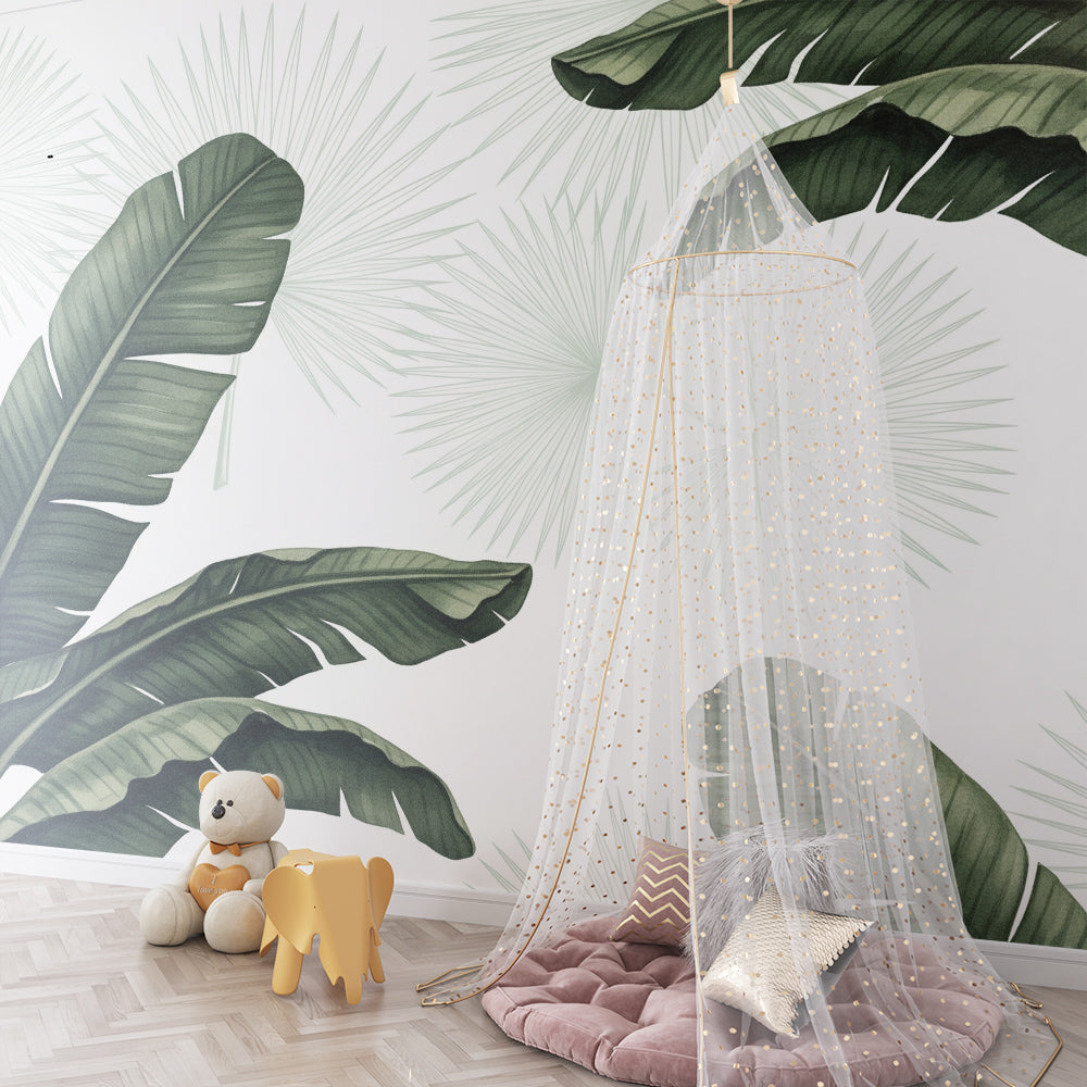 Kids-Mundo banana leaf wall mural on a wall in a jungle-themed children's playroom