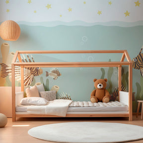 Colorful tropical fish wallpaper transforming kids playroom into underwater adventure space