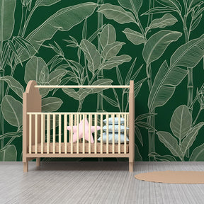 Green botanical mural wallpaper in modern kids bedroom with natural tropical leaf design