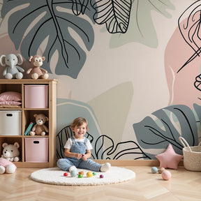 Tropical leaves mural wallpaper in soft pastels decorating modern nursery by Kids-Mundo