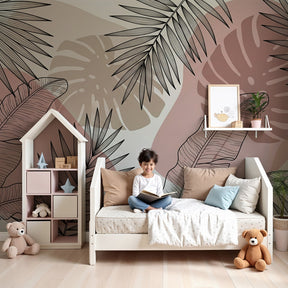 Tropical leaves mural wallpaper in modern nursery with soft pink and beige tones by Kids-Mundo