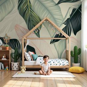 Tropical leaves mural wallpaper in serene nursery with natural wood crib by Kids-Mundo