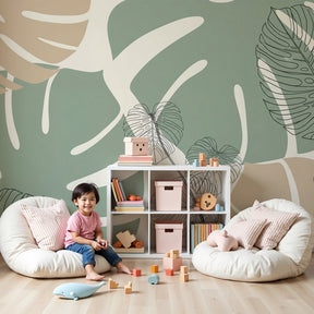 Tropical leaves mural wallpaper in sage green and beige creating serene nursery decor by Kids-Mundo