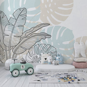 Nature-inspired tropical leaves wallpaper transforming children's playroom into botanical sanctuary