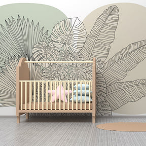 Elegant tropical leaf wallpaper transforming children's playroom into jungle adventure space