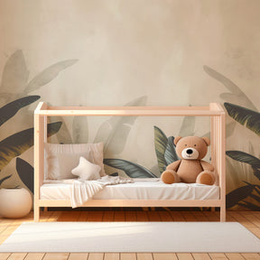 Botanical mural wallpaper featuring tropical leaves in cozy children's playroom