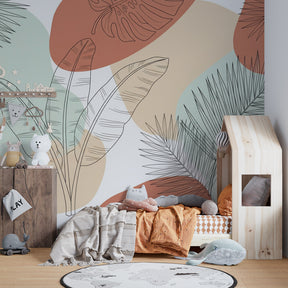 Monstera and palm leaf wallpaper design enhancing modern kids playroom decor