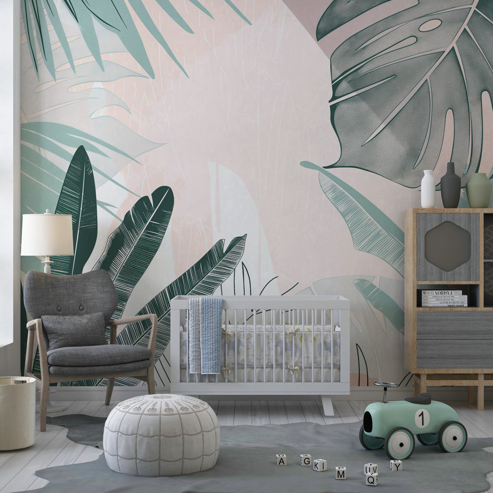 Green and pink tropical leaves wallpaper transforming children's playroom into botanical paradise
