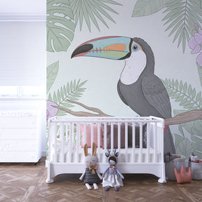 Vibrant tropical bird wallpaper for children's playroom featuring toucan and botanical elements