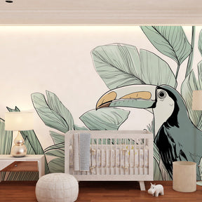 Jungle bird mural wallpaper with tropical leaves in bright kids playroom setting