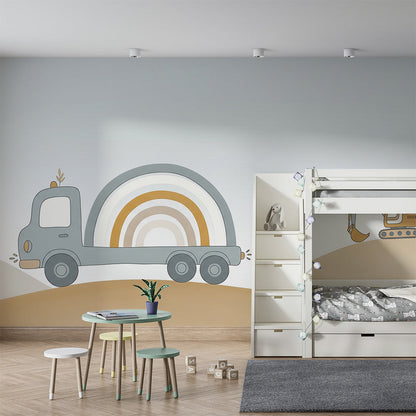 Kids-Mundo rainbow truck wall mural covering a kids bedroom wall beside a wooden bed frame.