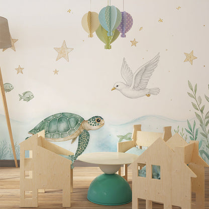 Kids-Mundo turtle, dove and starry sky wall mural styled in a bright children's playroom